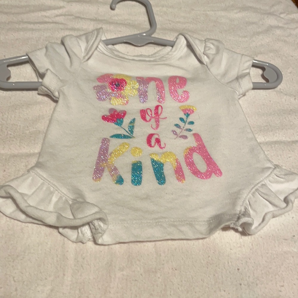 White,multi colored shirt